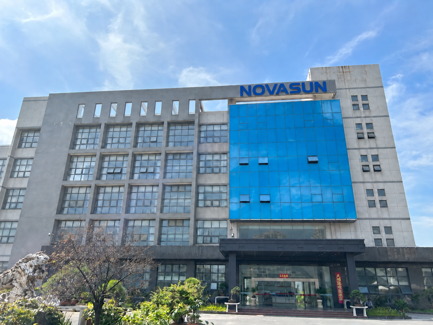 NOVASUN company building with blue entrance facade