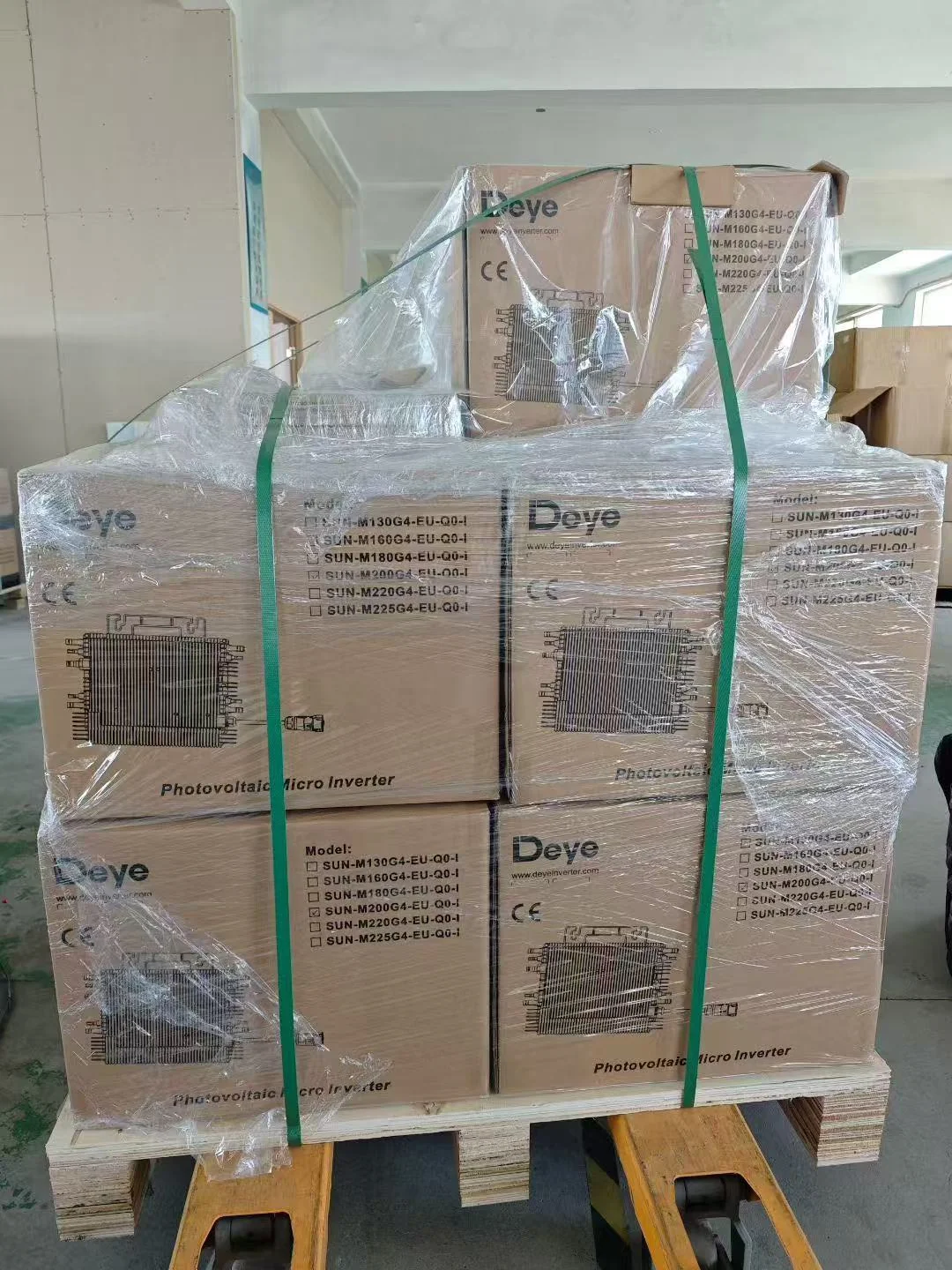Packaged grid-tied inverters secured on a pallet